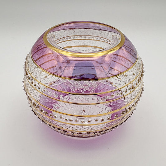 Fair trade handblown glass candle holder with intricate patterns, gold detail and pink rim, ethically handmade