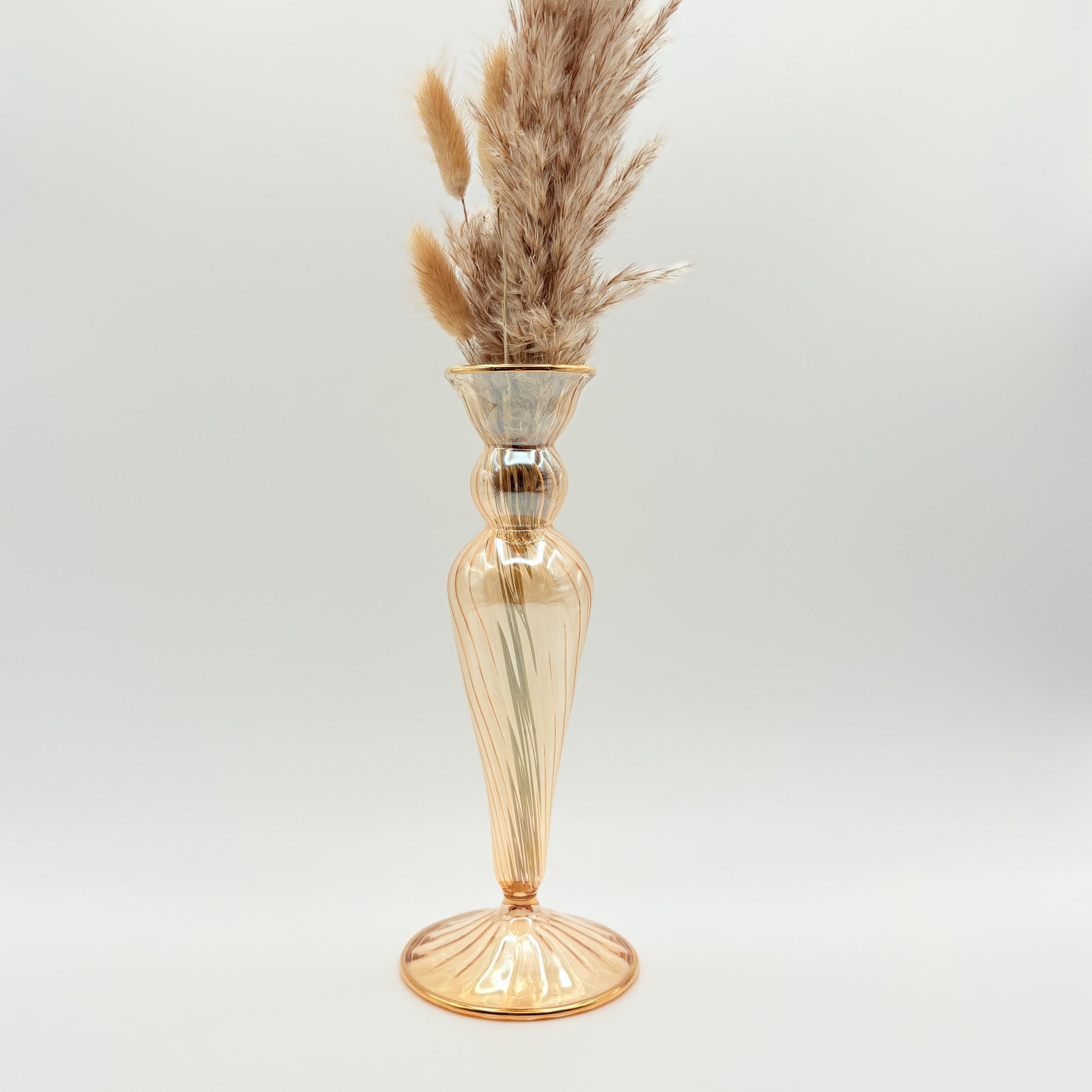 Blown glass cone shaped vase in iridescent yellow