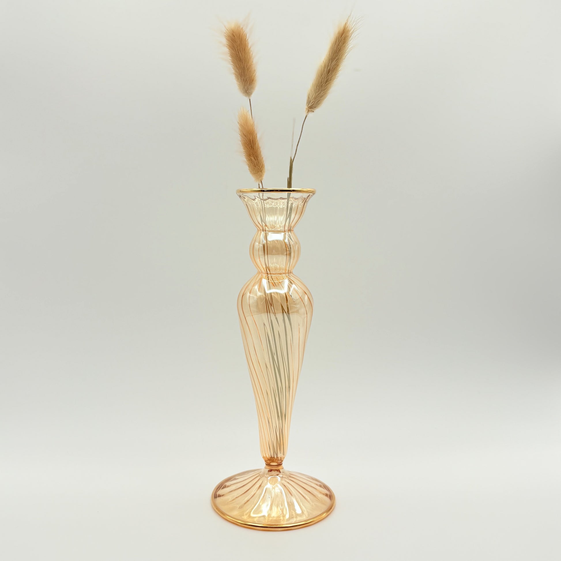 Blown glass cone shaped vase in iridescent yellow