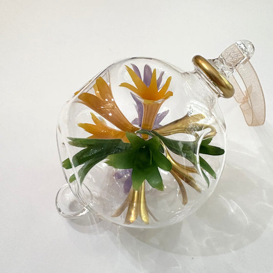 Decorative blown glass ornament with floral design inspired from Klimt's The Kiss painting, fair trade