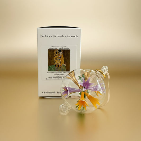 Decorative blown glass ornament with floral design inspired from Klimt's The Kiss painting, fair trade