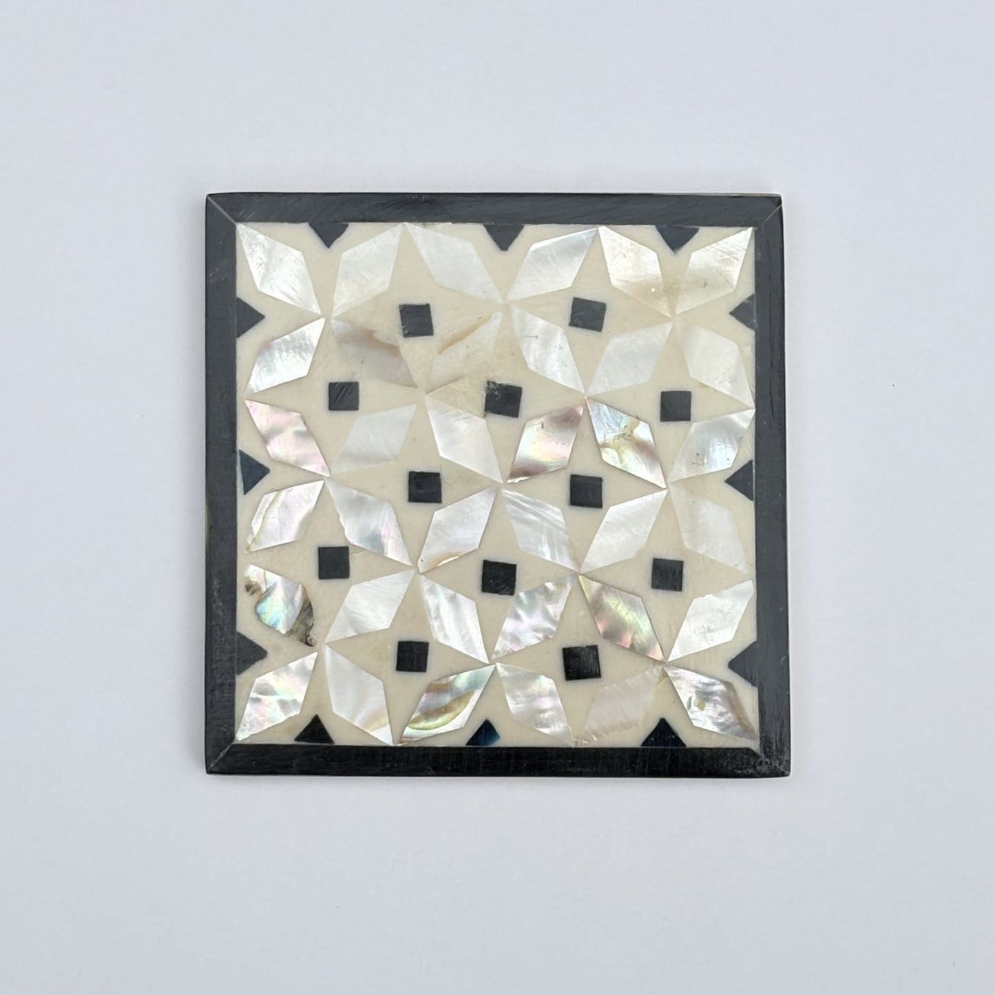 Set of four square wood coasters inlaid with mother of pearl in a geometric pattern, fair trade handmade, arabesque marquetry