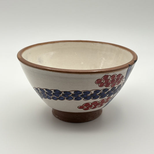 Handcrafted fair trade ceramic bowl with date palm tree design