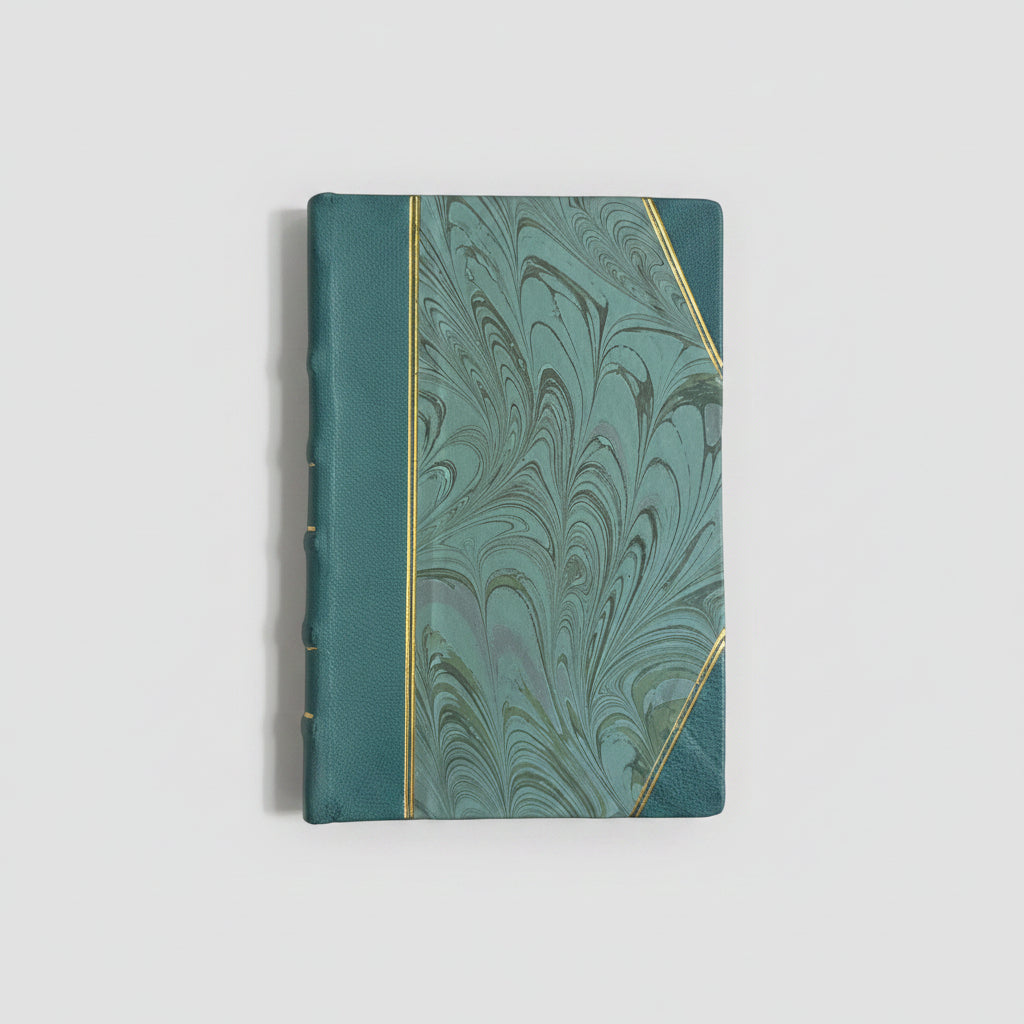 Hand-bound hardcover notebook with teal blue leather binding and corners, featuring a marbled Ebru paper and thin gold decorative lines, Fair trade handcrafted