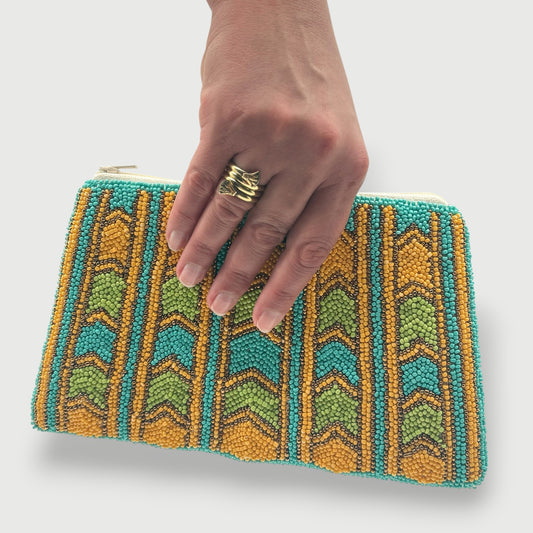 Colorful fair trade hand-beaded clutch with geometric chevron design
