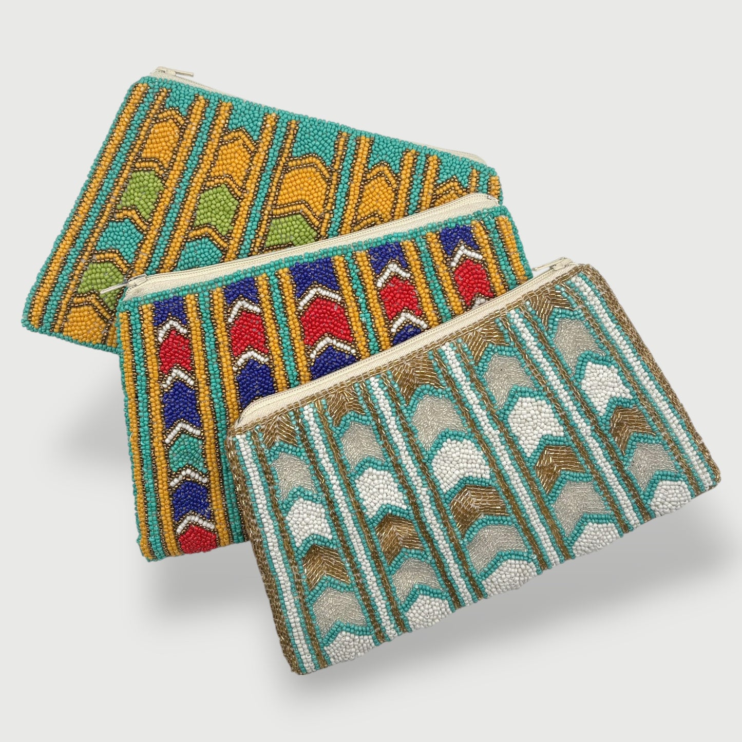 Colorful fair trade hand-beaded clutch with geometric chevron design