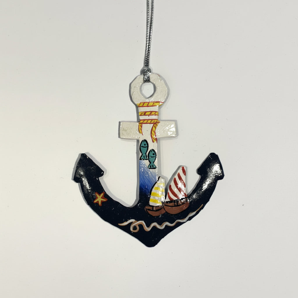 Fair trade handcrafted upcycled metal anchor ornament with a sailboat and fish design, artisan-made, sustainable decor