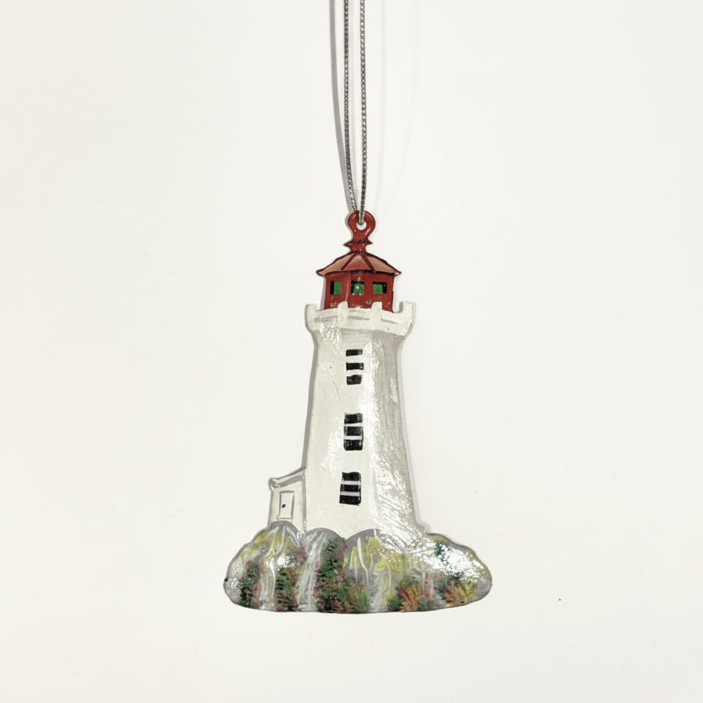 Fair trade handcrafted upcycled metal lighthouse ornament with a red top, sustainably crafted, artisan made
