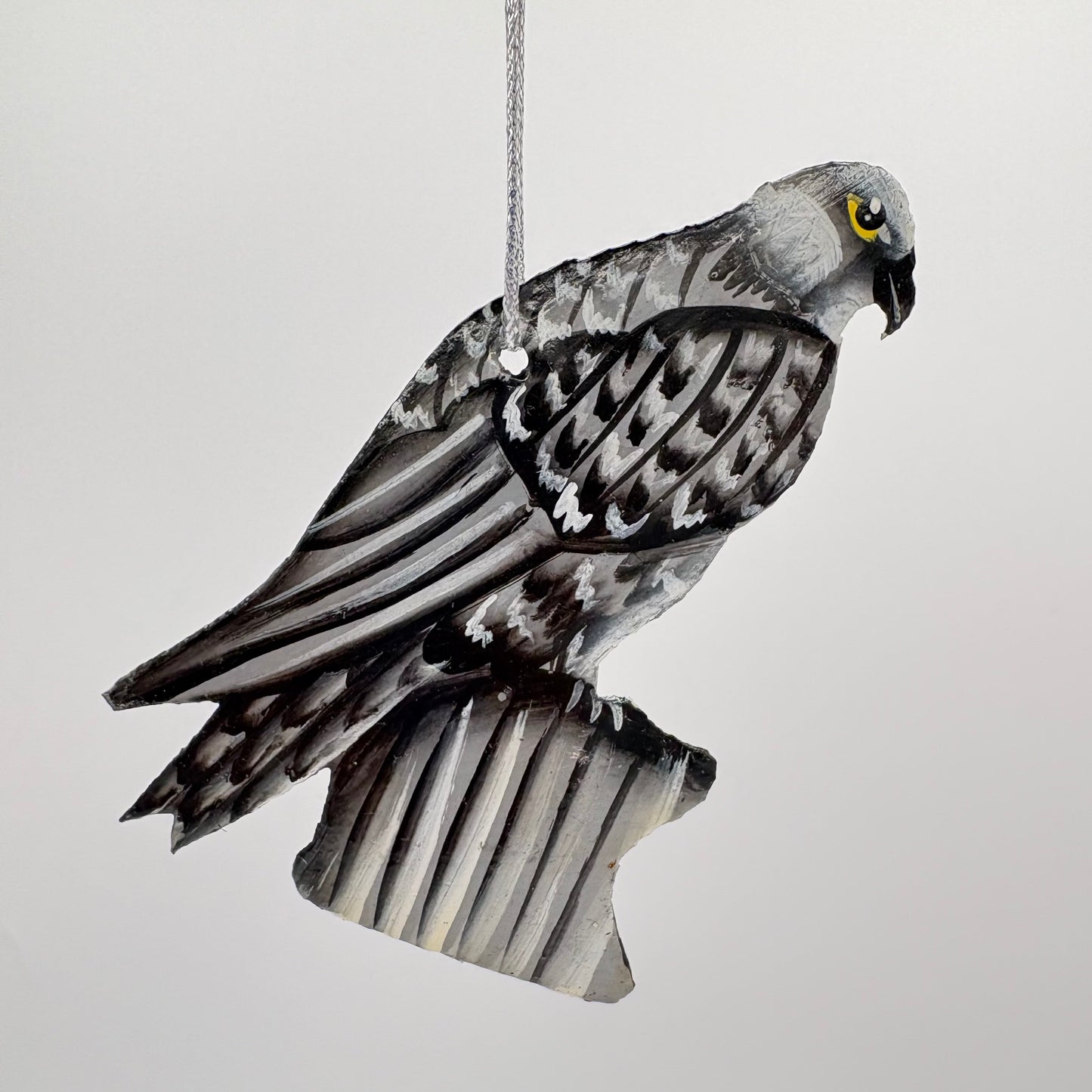 Sustainable handcrafted upcycled metal ornament of a Gyrfalcon, fair trade, ethically handmade, eco-friendly