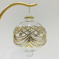 Decorative handblown glass bauble ornament with gold baroque art inspired design