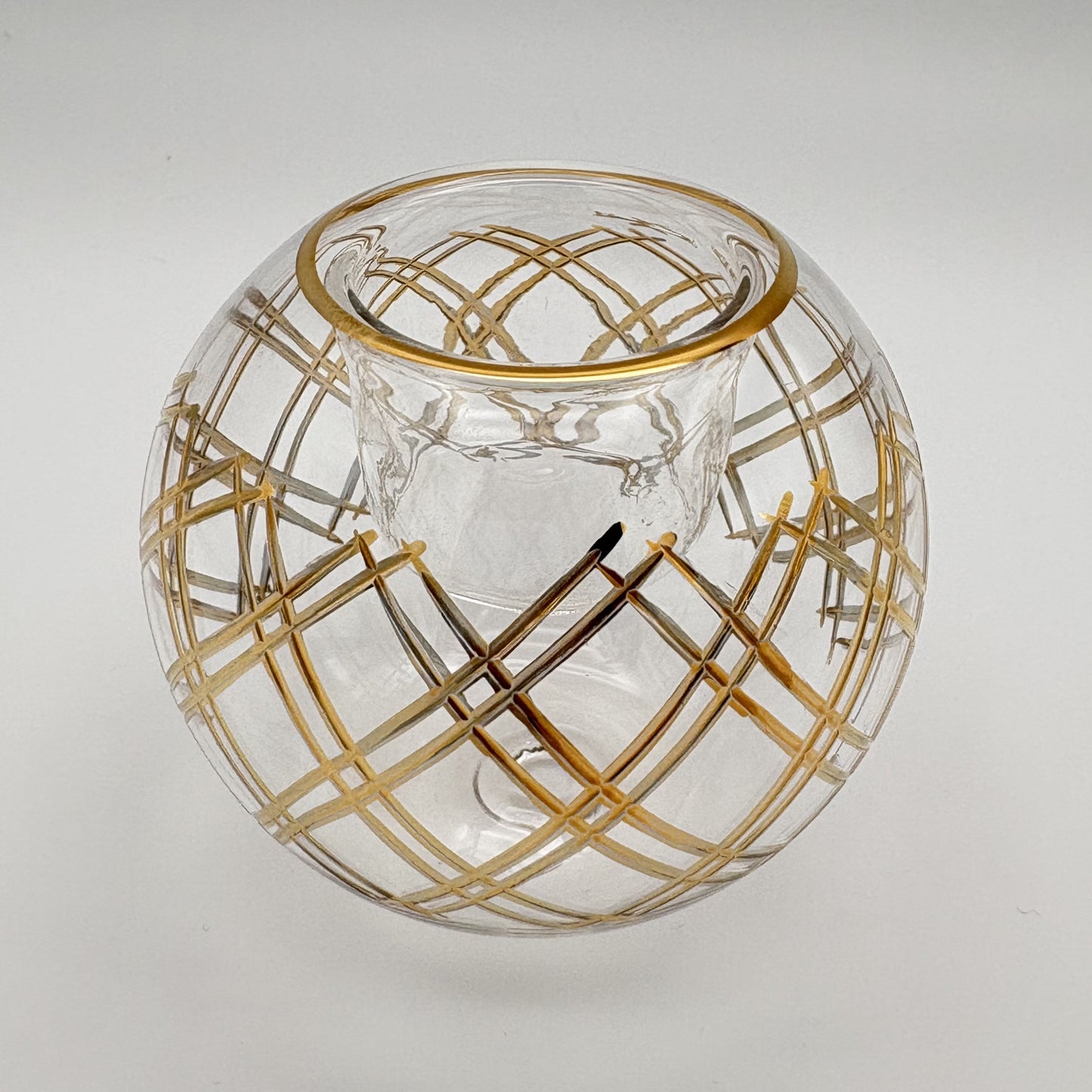 Fair trade handblown glass candle holder with plaid cut pattern and gold detail, ethically handmade