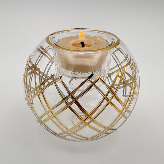 Fair trade handblown glass candle holder with plaid cut pattern and gold detail, ethically handmade