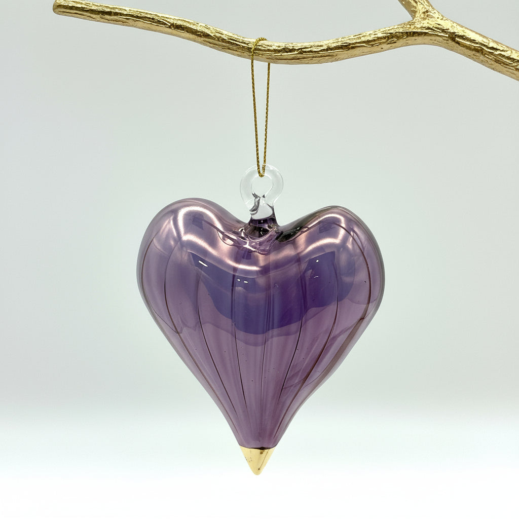 Purple heart-shaped handblown glass ornament with gold tip