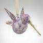 Blown glass lavender and white hummingbird ornament with gold accents, fair trade