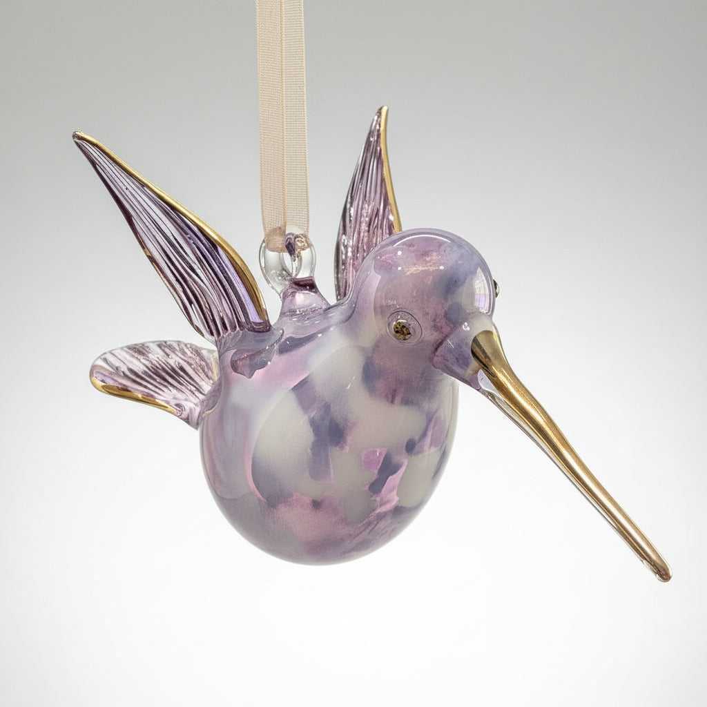 Blown glass lavender and white hummingbird ornament with gold accents, fair trade