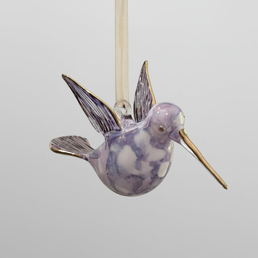 Blown glass lavender and white hummingbird ornament with gold accents, fair trade
