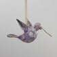 Blown glass lavender and white hummingbird ornament with gold accents, fair trade