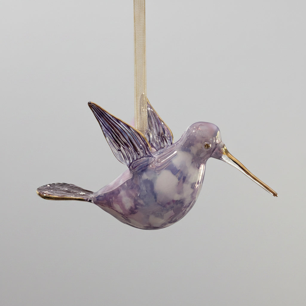 Blown glass lavender and white hummingbird ornament with gold accents, fair trade
