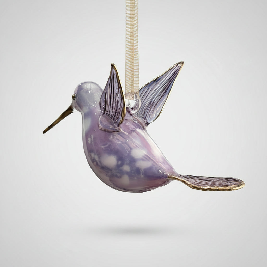 Blown glass lavender and white hummingbird ornament with gold accents, fair trade