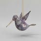 Blown glass lavender and white hummingbird ornament with gold accents, fair trade