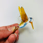 Fair trade artisanal handmade glass hummingbird in amber, ethically handcrafted