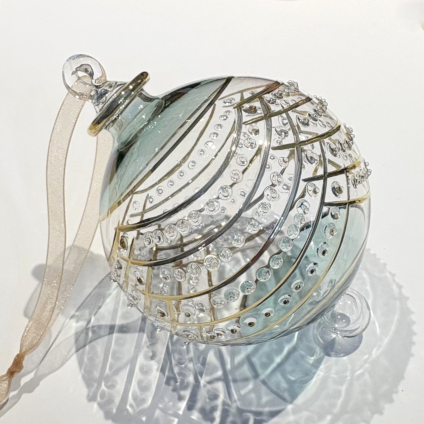 Handblown glass ornament with Art Decor Style Design, painted in gold and green