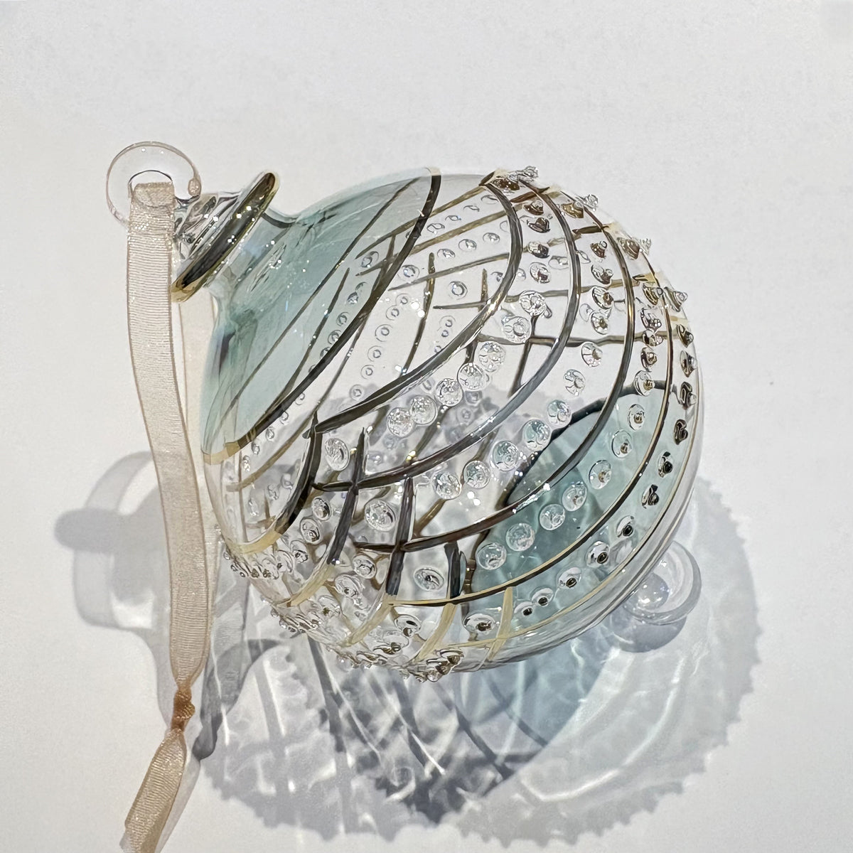 Handblown glass ornament with Art Decor Style Design, painted in gold and green