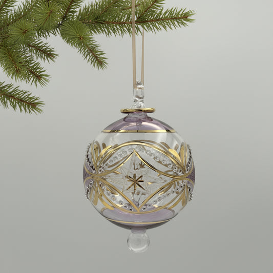 Handblown glass ornament with  carousel and stars design with tops hand painted in lavender and with gold highlights