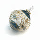Hand-blown glass bauble ornament with a blue and gold painted design