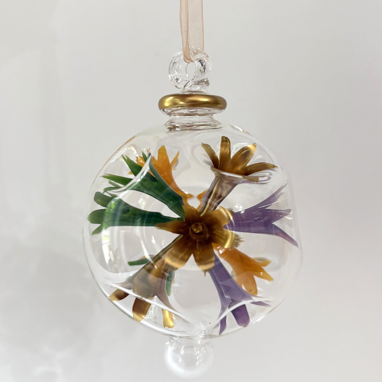 Decorative blown glass ornament with floral design inspired from Klimt's The Kiss painting, fair trade