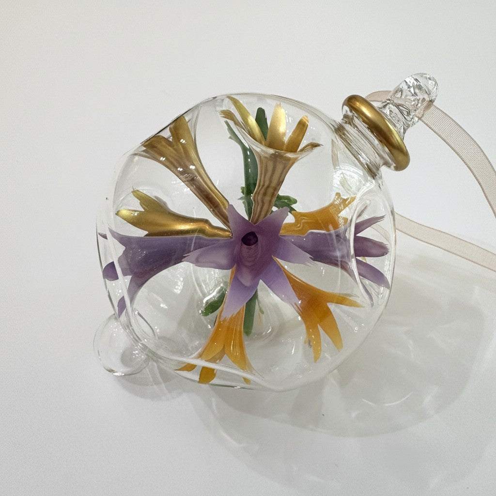 Decorative blown glass ornament with floral design inspired from Klimt's The Kiss painting, fair trade