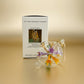 Decorative blown glass ornament with floral design inspired from Klimt's The Kiss painting, fair trade