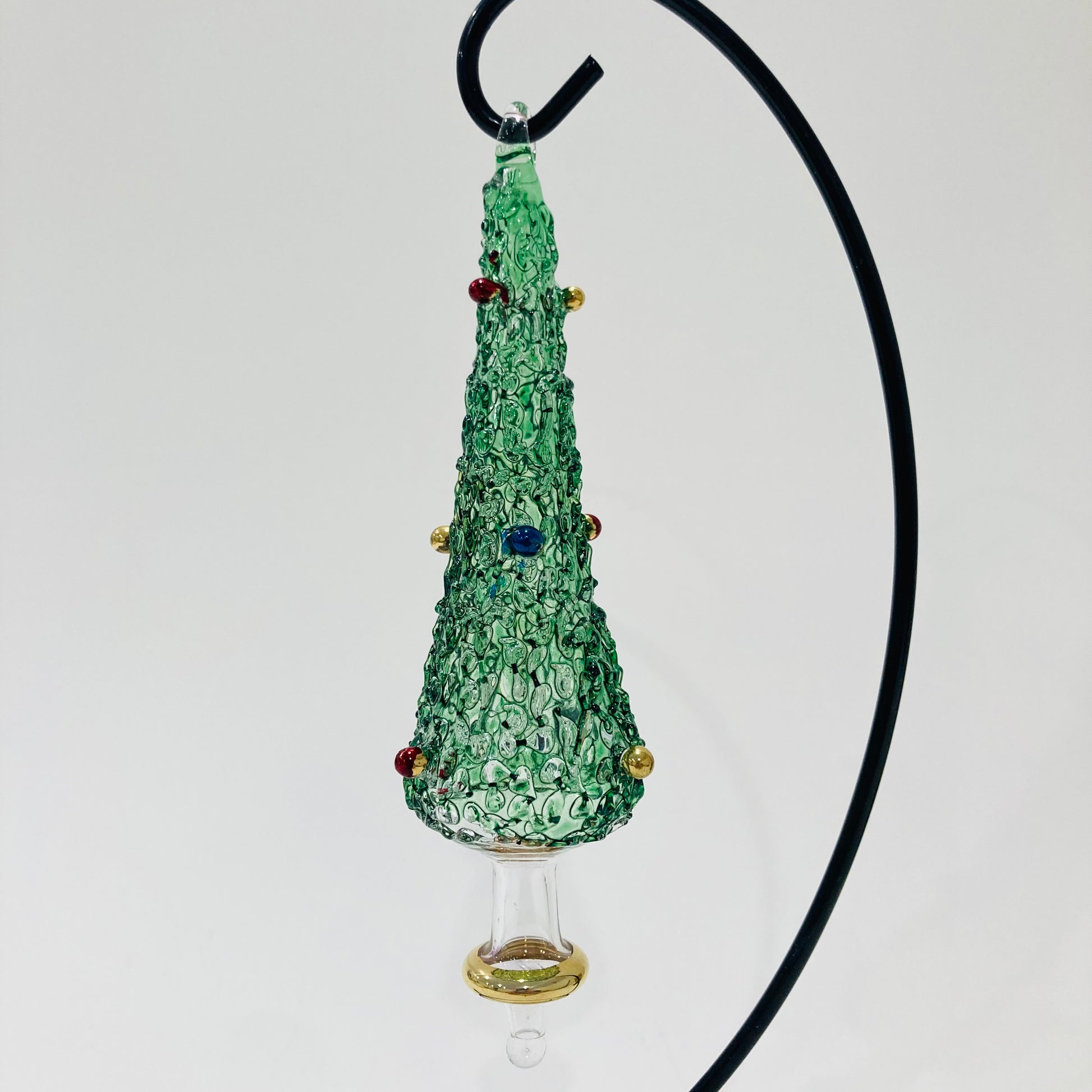 Hand-blown glass green pine tree shpaed ornament  with colored baubles
