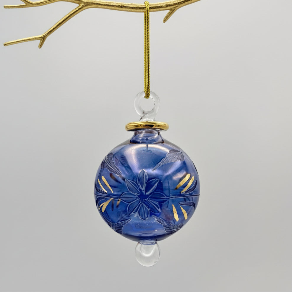 Fair Trade blue handblown glass ornament with etched gold floral patterns 