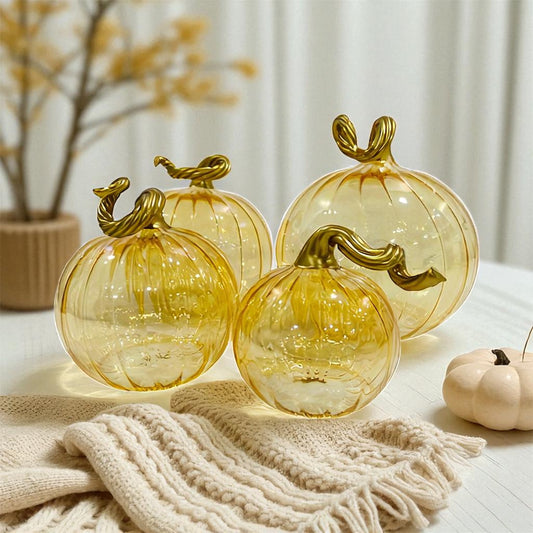 Hand-blown glass iridescent amber pumpkins with gold stems