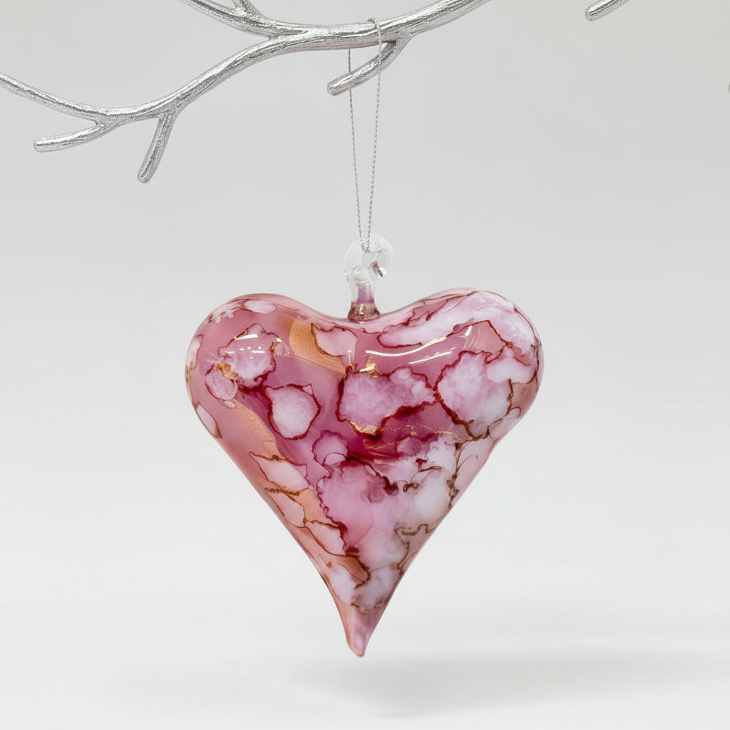 Heart-shaped pink and white marbled handblown glass ornament