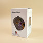 Decorative blown glass ornament with floral design inspired from Klimt's The Kiss painting, fair trade