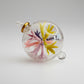 Hand-blown glass bauble ornament with floral design on a transparent background, fair trade handcrafted