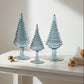 Ethically handcrafted handblown glass Christmas trees in iridescent light blue wiht hand painted gold higlights