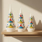 Decorative white handblown glass Christmas tree cones with colorful designs in three sizes, fair trade, ethically handmade