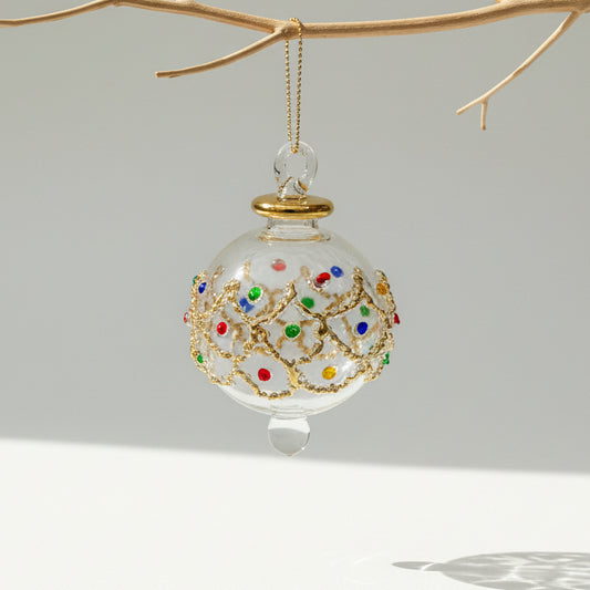 Fair trade handblown glass bauble ornament with gold and colored gem embellishments