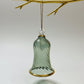 Decorative handblown glass iridescent pastel colored wavy bell ornaments with glass clapper, sage