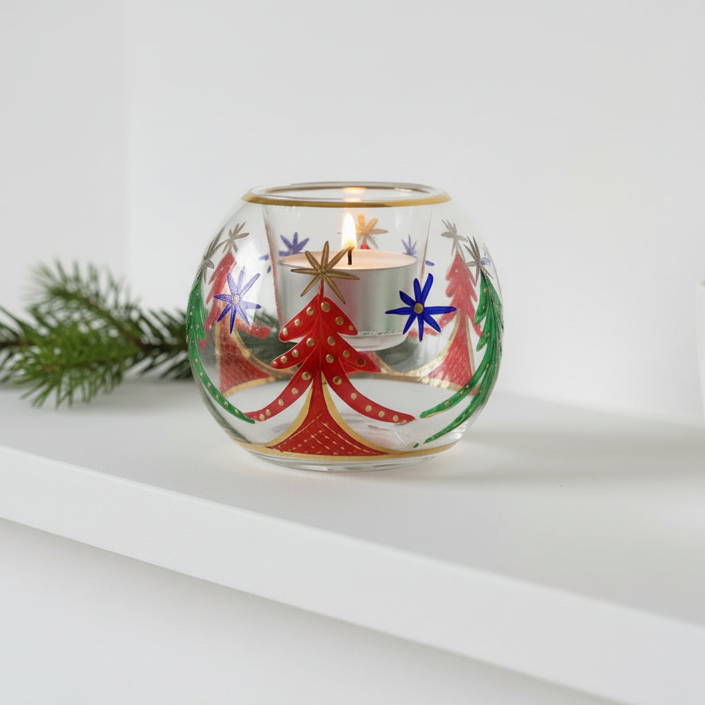 Decorative hand-blown glass candle holder with Christmas trees design and gold detail
