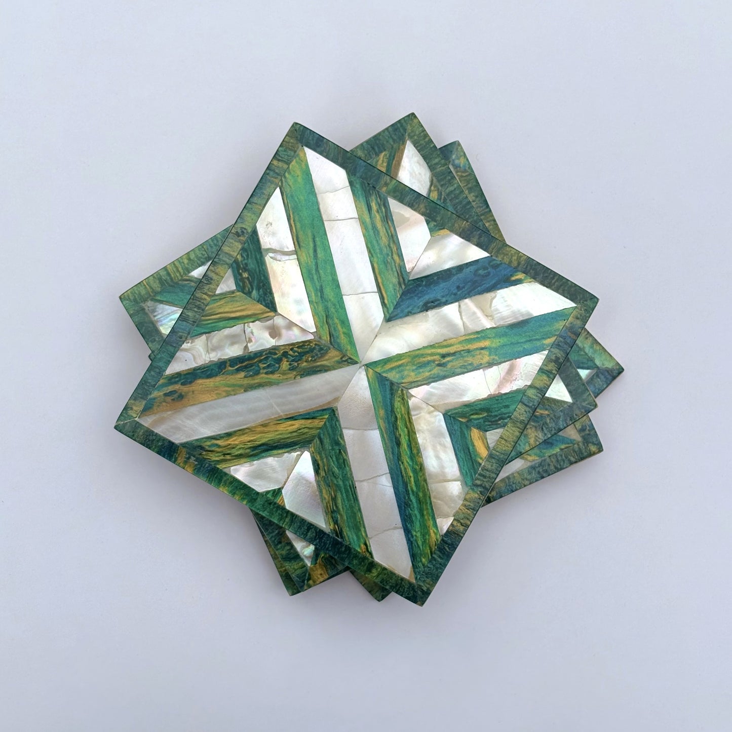 Set of four square wood coasters inlaid with mother of pearl in a geometric pattern, fair trade handmade, arabesque marquetry