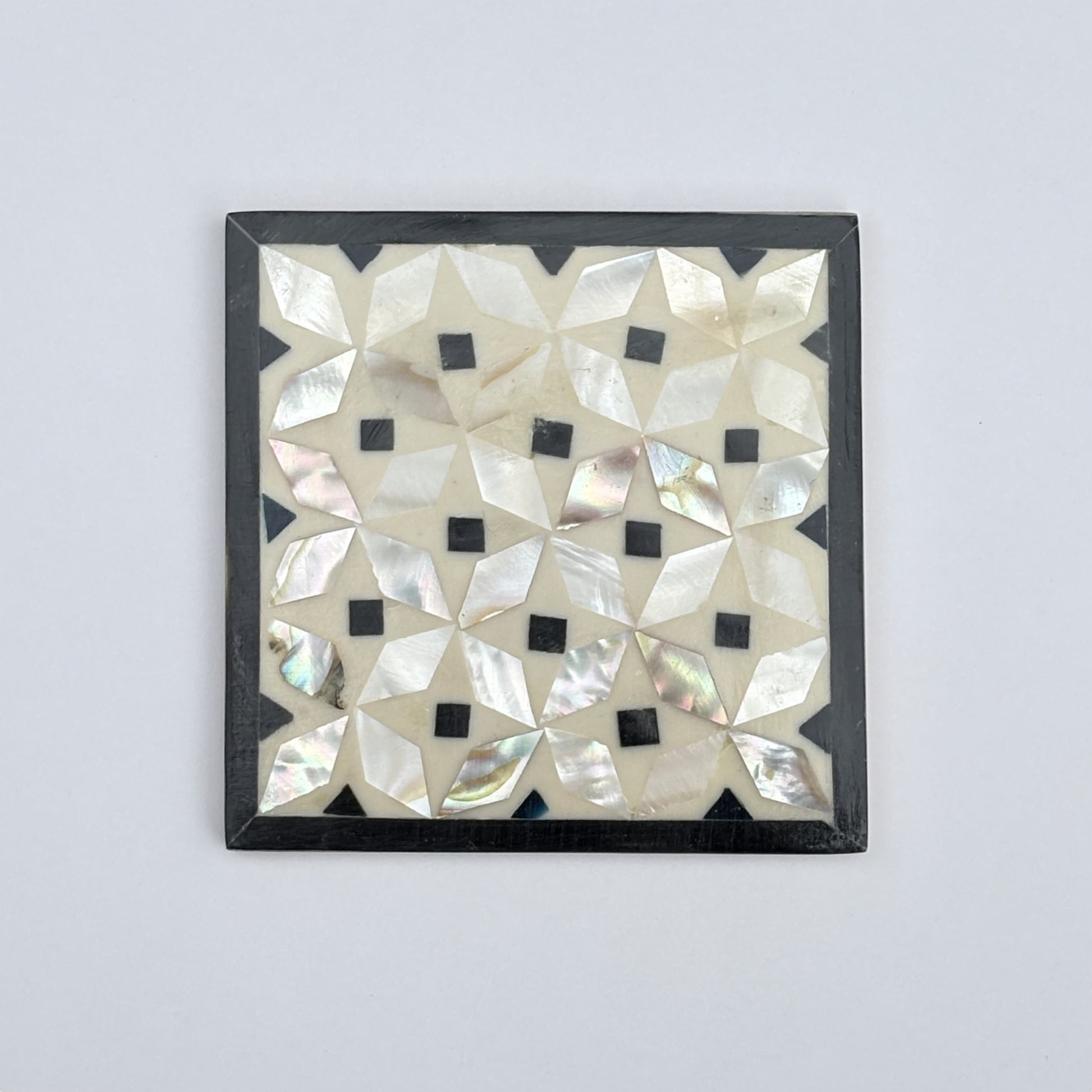 Set of four square wood coasters inlaid with mother of pearl in a geometric pattern, fair trade handmade, arabesque marquetry