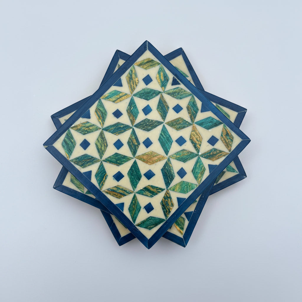 Set of four geometric patterned arabesque wood coasters inlaid with mother of pearl, marquetry, fair trade