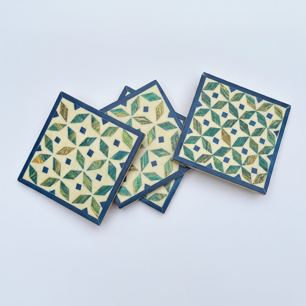 Set of four geometric patterned arabesque wood coasters inlaid with mother of pearl, marquetry, fair trade