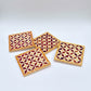 Set of four square wood coasters inlaid with mother of pearl in a geometric pattern, fair trade handmade, arabesque marquetry