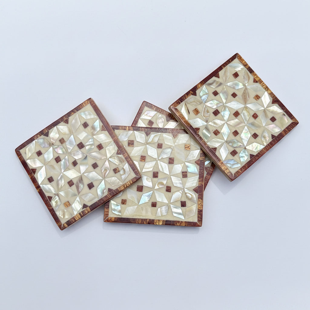 Set of four geometric patterned arabesque wood coasters inlaid with mother of pearl, marquetry, fair trade