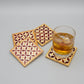 Set of four square wood coasters inlaid with mother of pearl in a geometric pattern, fair trade handmade, arabesque marquetry